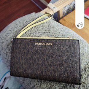 Michael kors double zipper wallet.